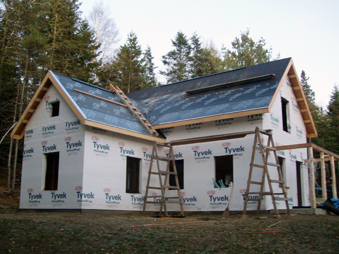 bedroom roof framed with waterproof membrane over the sheathing